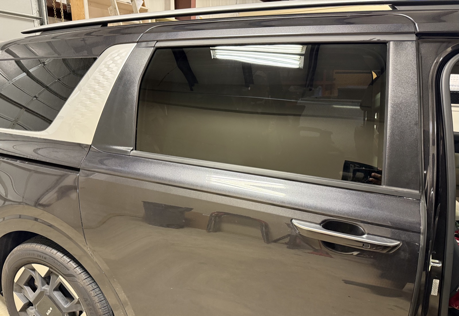 Freshly installed rear door and quarter glass on a Kia SUV, showing the clean fit and finish of auto glass work at South Texas Auto Glass in Corpus Christi, TX